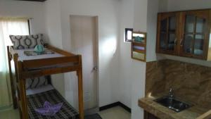 Postel nebo postele na pokoji v ubytování Sealor Pension House