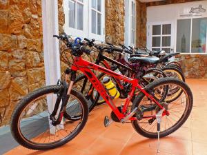 a group of bikes parked next to a building at Royal Kalaw Hills Resort in Kalaw