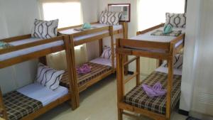 Postel nebo postele na pokoji v ubytování Sealor Pension House