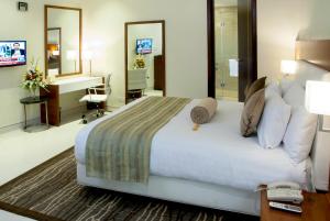 Postel nebo postele na pokoji v ubytování Avari Boutique Multan + 21 fotografií