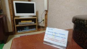 TV a/nebo společenská místnost v ubytování Asakusa Ryokan Toukaisou