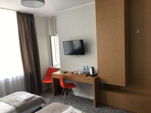 TV a/nebo společenská místnost v ubytování 7 Rooms MTP