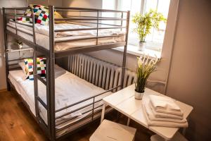 Za Murami Hostel客房内的一张或多张床位