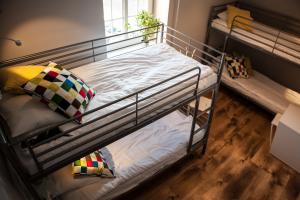 Za Murami Hostel客房内的一张或多张床位