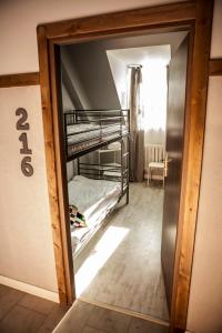 Za Murami Hostel客房内的一张或多张床位