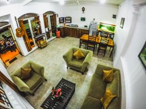 Ein Sitzbereich in der Unterkunft Wijenayake's - Beach Haven Guest House - Galle Fort