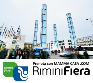a blurry picture of a city with a sign for a company at Mamma Casa Superior in Rimini
