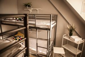 Za Murami Hostel客房内的一张或多张床位