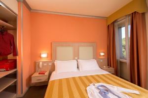 Letto o letti in una camera di Hotel Mediterraneo