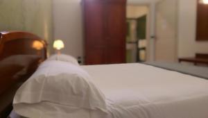 Postel nebo postele na pokoji v ubytování B&B Porta di Mare