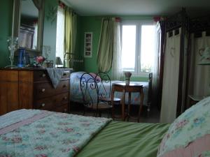 Letto o letti in una camera di Chambres d'hôtes Aux Portes de Bréhat