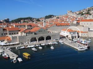 an aerial view of a harbor with boats in the water at Old Town Port Apartments in Dubrovnik