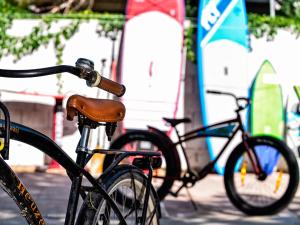 two bikes parked next to each other on a street at Farosardo in SantʼAndrea