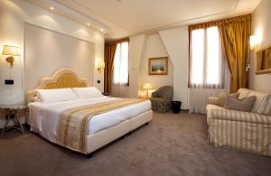 Postel nebo postele na pokoji v ubytování Ca' San Giorgio B&B
