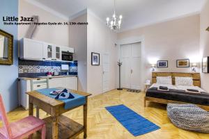 A kitchen or kitchenette at Little Americas Concert Hall Apartments