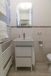 Bilik mandi di Ansbachs City Apartment