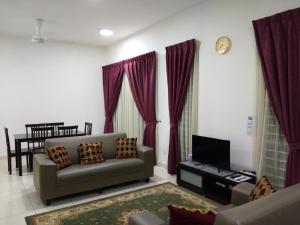 TV a/nebo společenská místnost v ubytování Masayu Putrajaya Homestay