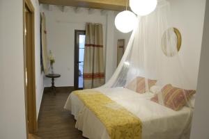 Katil atau katil-katil dalam bilik di Casa Rural Pueblos Blancos