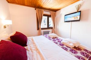 Postel nebo postele na pokoji v ubytování Tunqueley Hotel