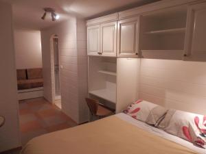 Postel nebo postele na pokoji v ubytování Hotel du Gambrinus