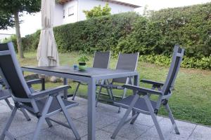 Ein Garten an der Unterkunft Amselstern Binz