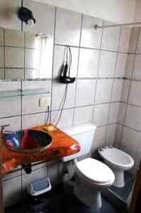 Ванная комната в Alto Rolando Apartamentos