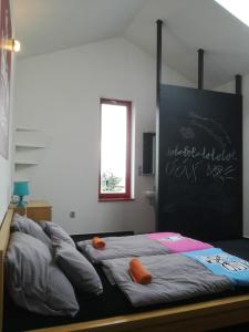 Postel nebo postele na pokoji v ubytování Penzion UAX