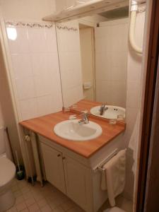 Koupelna v ubytování Hotel du Gambrinus