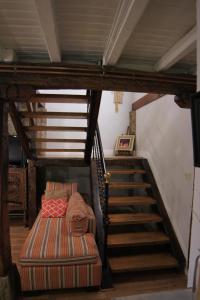 A bed or beds in a room at Agroturismo Ibarra
