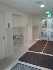 a bathroom with a sink and a toilet in a building at Shoshone-Bannock Hotel and Event Center in Fort Hall