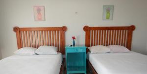Cama ou camas em um quarto em Blue Coconut Cancun Hotel