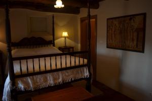 Quinta do Espírito Santo tesisinde bir odada yatak veya yataklar