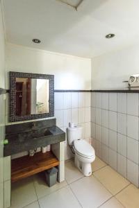 Koupelna v ubytování Arjuna Homestay + 37 fotografií