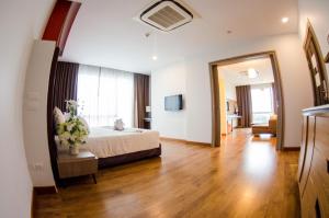 Ένα ή περισσότερα κρεβάτια σε δωμάτιο στο Prajaktra Design Hotel