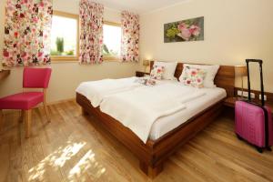 
Ein Bett oder Betten in einem Zimmer der Unterkunft BIO Hotel Bayerischer Wirt Augsburg
