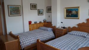 A bed or beds in a room at B&B L'Arca di Noè