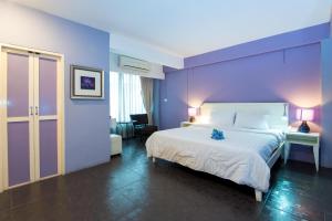 Postel nebo postele na pokoji v ubytování Lilac Relax-Residence