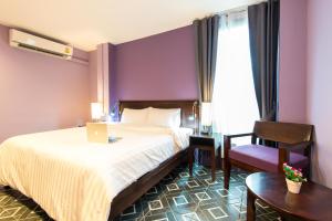 Postel nebo postele na pokoji v ubytování Lilac Relax-Residence