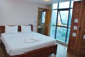 Voodi või voodid majutusasutuse Nice Hotel toas