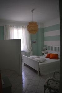 Cama ou camas em um quarto em La Divina