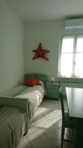 Cama ou camas em um quarto em La Divina
