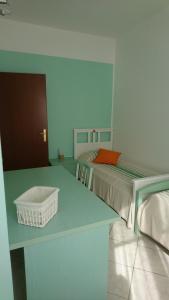 Cama ou camas em um quarto em La Divina