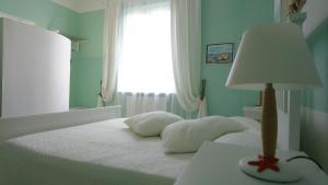 Cama ou camas em um quarto em La Divina