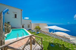a villa with a pool and a view of the ocean at Villa Imperati in Praiano