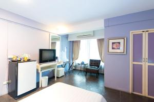 TV a/nebo společenská místnost v ubytování Lilac Relax-Residence