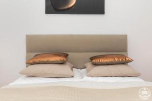 Posteľ alebo postele v izbe v ubytovaní Grace Apartment I