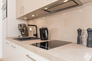Kuchyňa alebo kuchynka v ubytovaní Grace Apartment I
