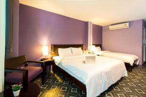 Postel nebo postele na pokoji v ubytování Lilac Relax-Residence