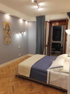 Postel nebo postele na pokoji v ubytování B&B Pescara Centro Luxury Suite