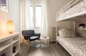 A bed or beds in a room at Chamberi Arrendamiento de Temporada
